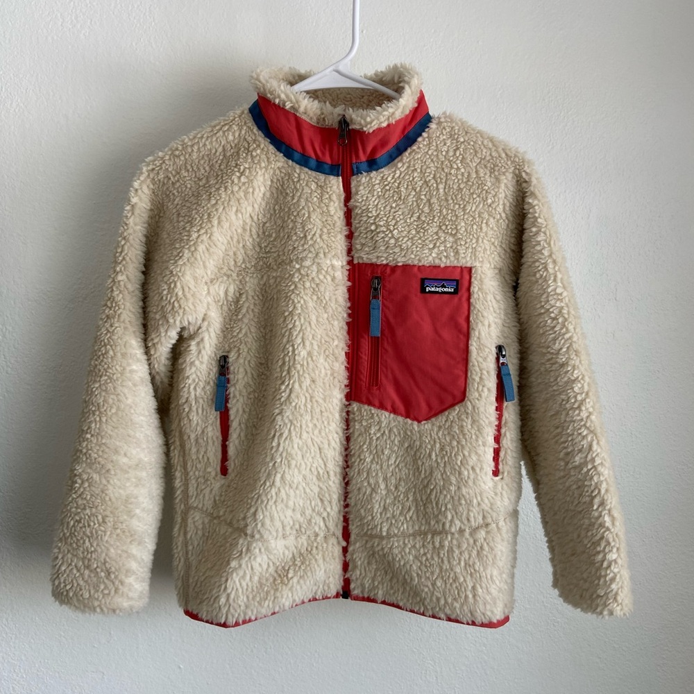 Patagonia Cream Sherpa Jacket with Red Trim and Blue Accents